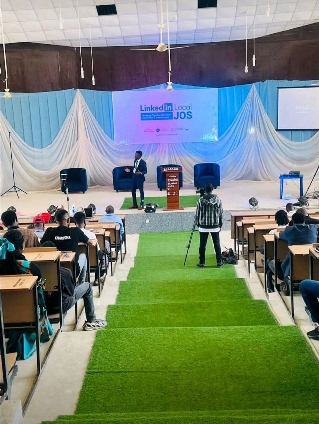 Tomide Williams on stage at LinkedIn Local Jos
