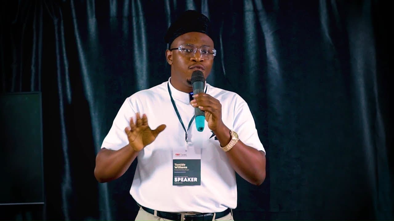 Tomide Williams speaking at TEDxTanke